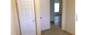 Unfurnished, carpeted bedroom with closet