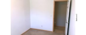 Unfurnished, carpeted bedroom