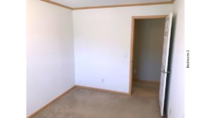 Unfurnished, carpeted bedroom