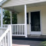 Front porch with white railings