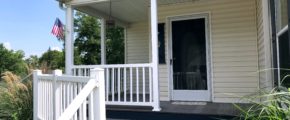 Front porch with white railings