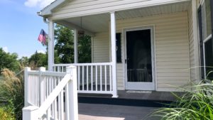 Front porch with white railings