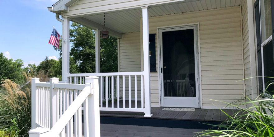 Front porch with white railings