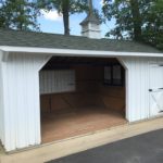 Small shed with mailboxes