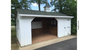 Small shed with mailboxes