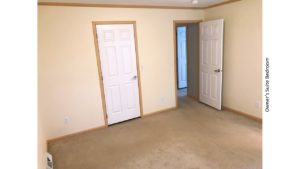 Unfurnished, carpeted bedroom with closet