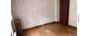 Unfurnished bedroom with hardwood floors and closet