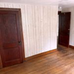 Unfurnished bedroom with hardwood floors and closet