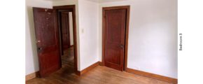 Unfurnished bedroom with hardwood floors and closet