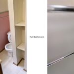 Full bathroom with vanity, toilet, shelving, and tub/shower combo