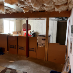 Boxes in an unfinished basement