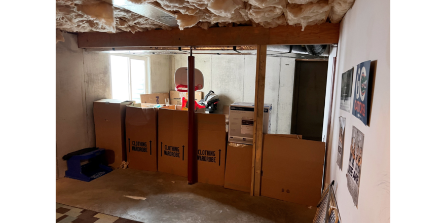 Boxes in an unfinished basement