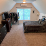 Bonus room set up as a bedroom