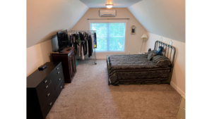 Bonus room set up as a bedroom