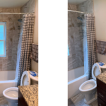 Bathroom with vanity, mirror, toilet, and tub/shower combo
