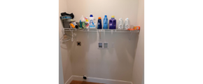 Laundry room with hookups and wire shelving