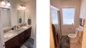 Owner's suite bathroom with double vanity, mirrors, toilet, and shower