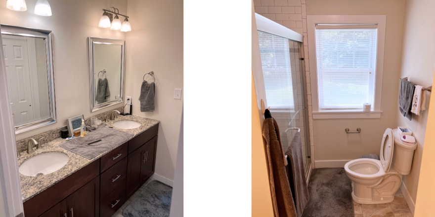 Owner's suite bathroom with double vanity, mirrors, toilet, and shower