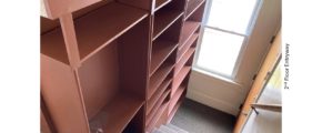 Stairs with built-in shelving on one side