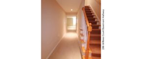 Carpeted hallway and staircase