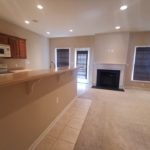 Kitchen and living room with gas fireplace