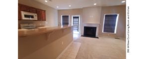 Kitchen and living room with gas fireplace