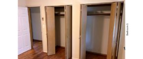 Unfurnished bedroom with hardwood floor