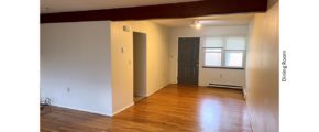 Unfurnished dining room with hardwood floor