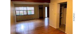 Unfurnished dining room with hardwood floor