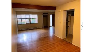 Unfurnished dining room with hardwood floor