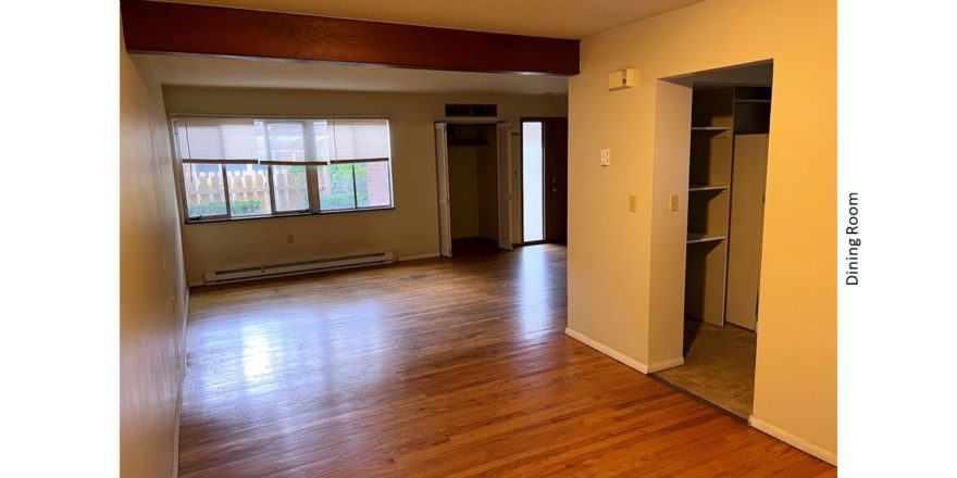 Unfurnished dining room with hardwood floor