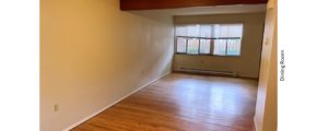 Unfurnished dining room with hardwood floor