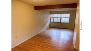 Unfurnished dining room with hardwood floor
