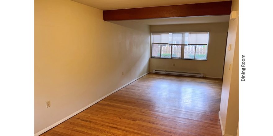 Unfurnished dining room with hardwood floor