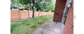 Concrete patio and small yard
