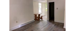 Bedroom with large windows and desk