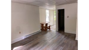 Bedroom with large windows and desk