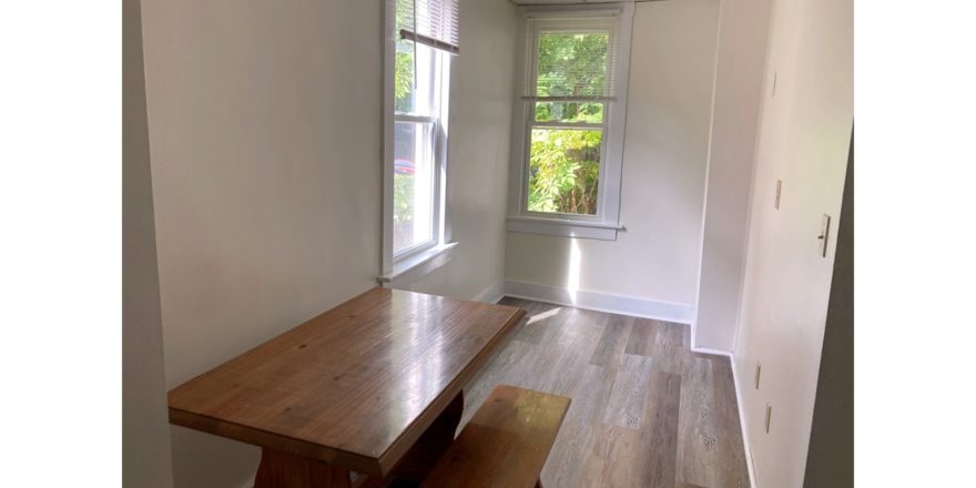 Bedroom with large windows and desk