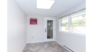 Entryway with laminate floor and door