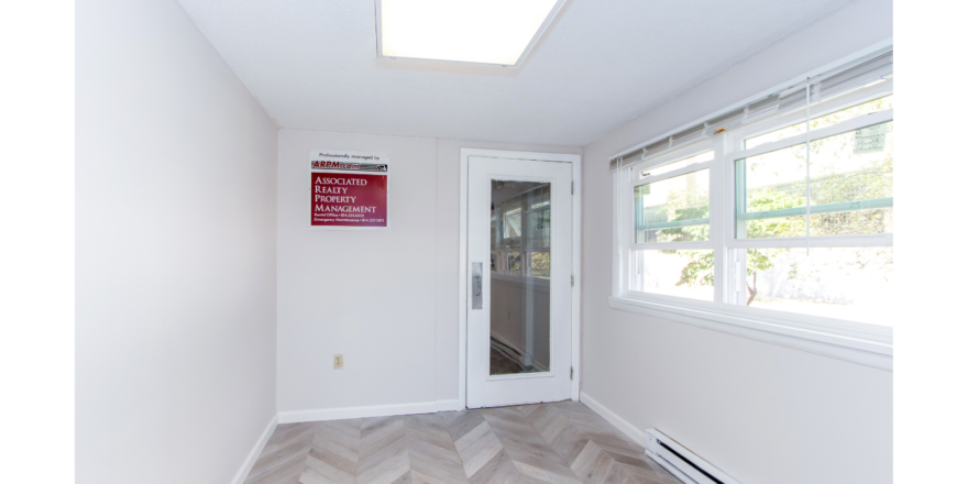 Entryway with laminate floor and door