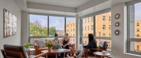 Friends hanging out in an apartment living room