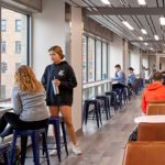 People studying and doing homework in a study lounge