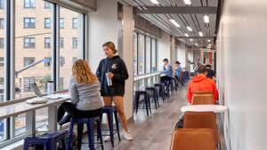 People studying and doing homework in a study lounge