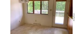 Dining room with door to deck and chandelier