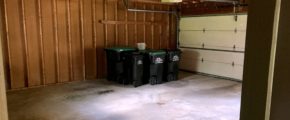 Garage with garbage and recycling bins