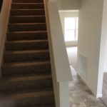 a staircase leading up to a second floor