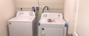 a washer and dryer in a small room