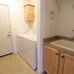 a washer and dryer in a small room