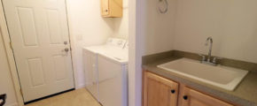 a washer and dryer in a small room