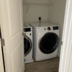 a washer and dryer in a closet